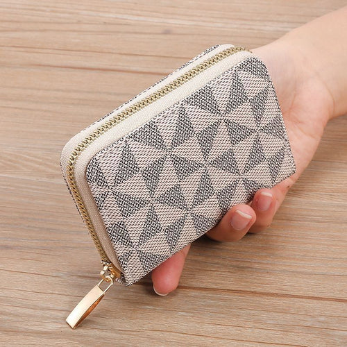 Geometrisch gemusterte Reißverschluss-Münztasche Karnz