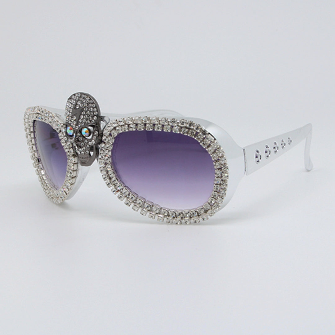 Damen Statement-Sonnenbrille mit außergewöhnlichem Totenkopf-Design und funkelndem Strassrahmen Karnz