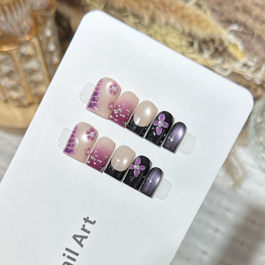 Dekoratives Press-On Nagelkunst-Set mit floralen und Edelsteinakzenten Karnz