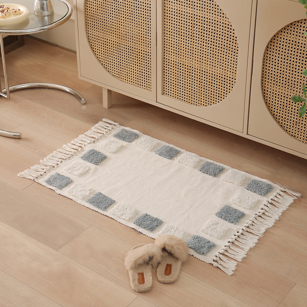 Gewebter Vorleger im Boho-Minimalstil mit kontrastiertem Tufting und Baumwollfransen Karnz