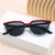 Damen moderne geometrische Sonnenbrille mit elegantem Design Karnz