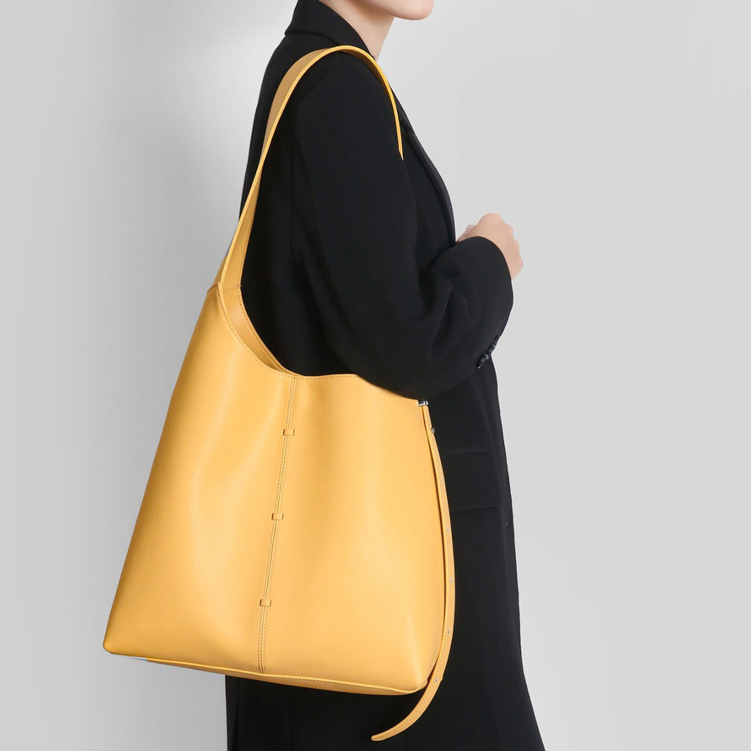 Elegante gebogene Bucket-Hobo-Tasche mit verstellbarem Seitengurt