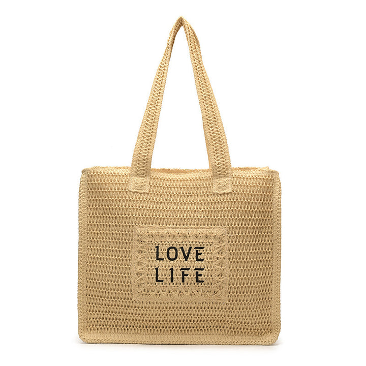 Gewebte Strohtasche mit inspirierendem Druck