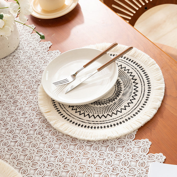 Runder handgewebter Baumwoll-Teppich mit Fransen und grafischem Ethno-Jacquard