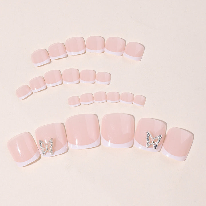 Kunstnagel-Set mit elegantem French Design und Glitzerakzenten Karnz