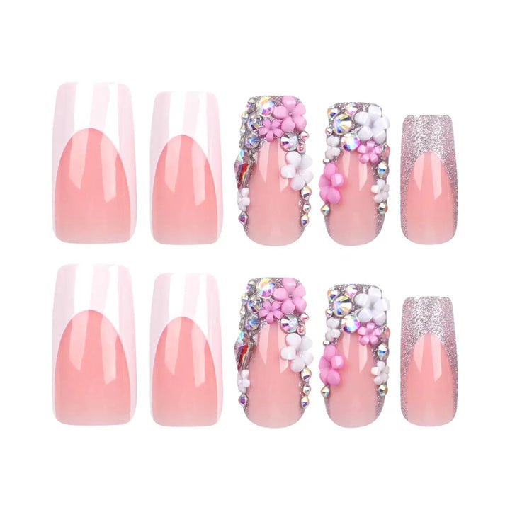 Kunstnagelset mit eleganten 3D-Blüten und Glitzerverzierungen Karnz