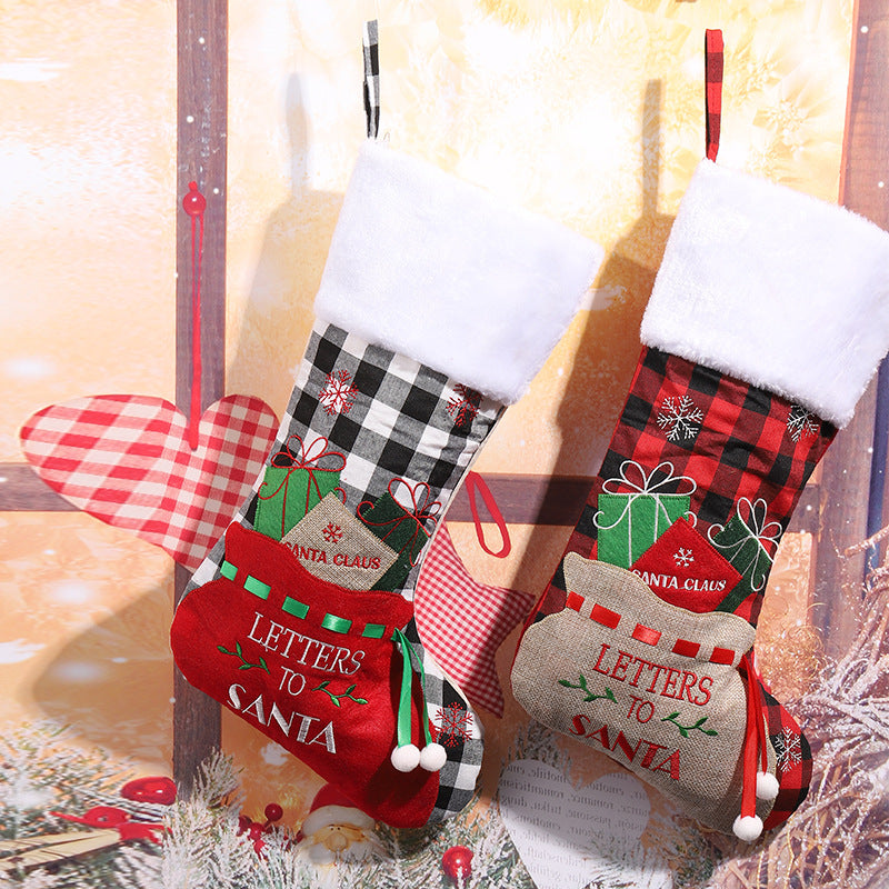 Festlicher Weihnachtsstrumpf mit klassischen Motiven Karnz