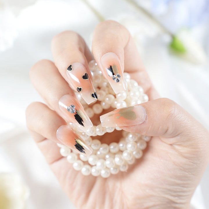 Künstlerisches herzverziertes Press-On-Nagelset Karnz