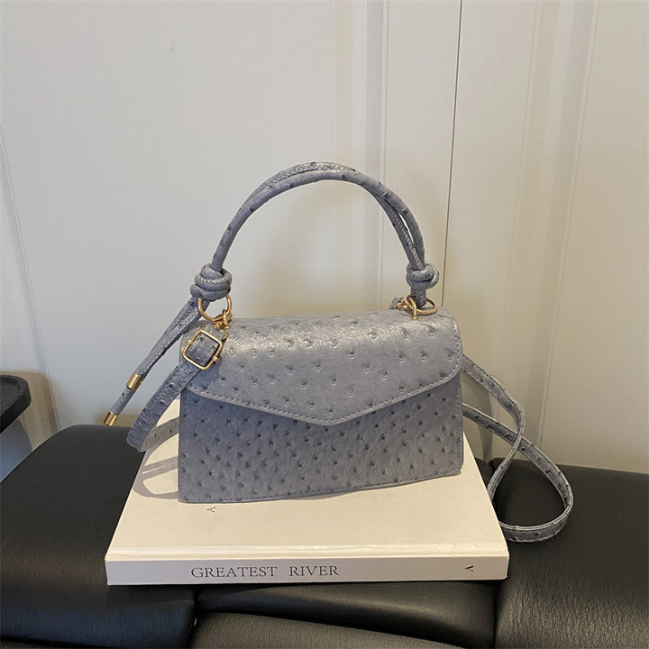 Strukturierte Lederhandtasche