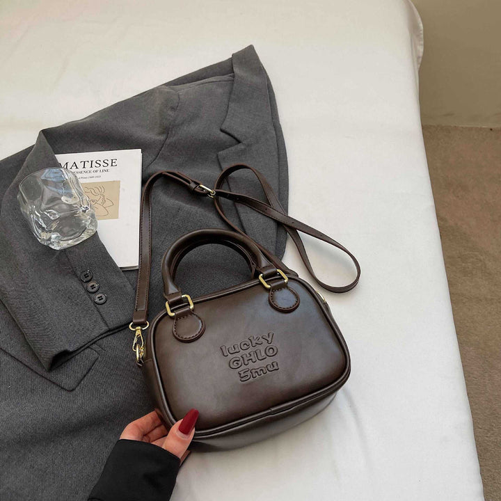 Vintage-inspirierte strukturierte Handtasche Karnz