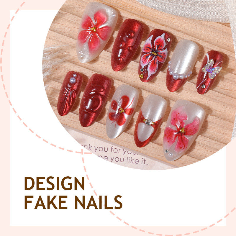 Kunstnagelset mit floralen Designs und Glitzerelementen Karnz