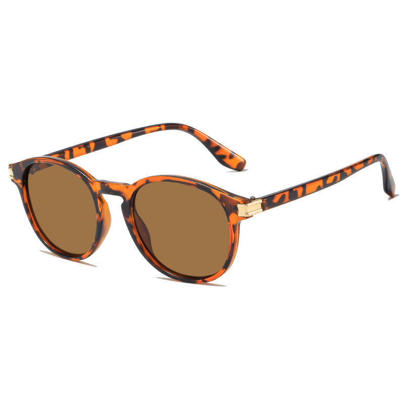 Damen elegante Sonnenbrille mit transparentem Rahmen und stylischen Akzenten Karnz