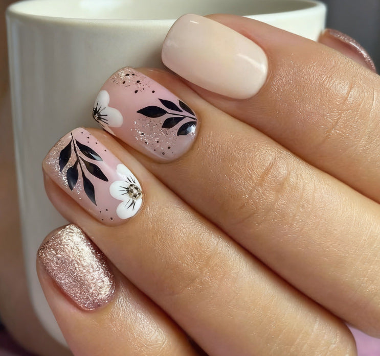 Elegante Blumen Grafik Nagel Set Karnz