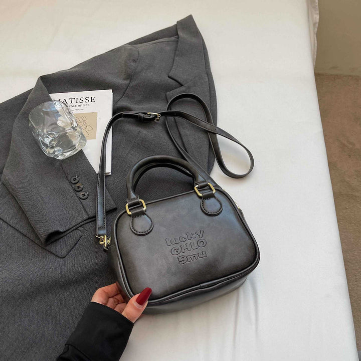 Vintage-inspirierte strukturierte Handtasche Karnz