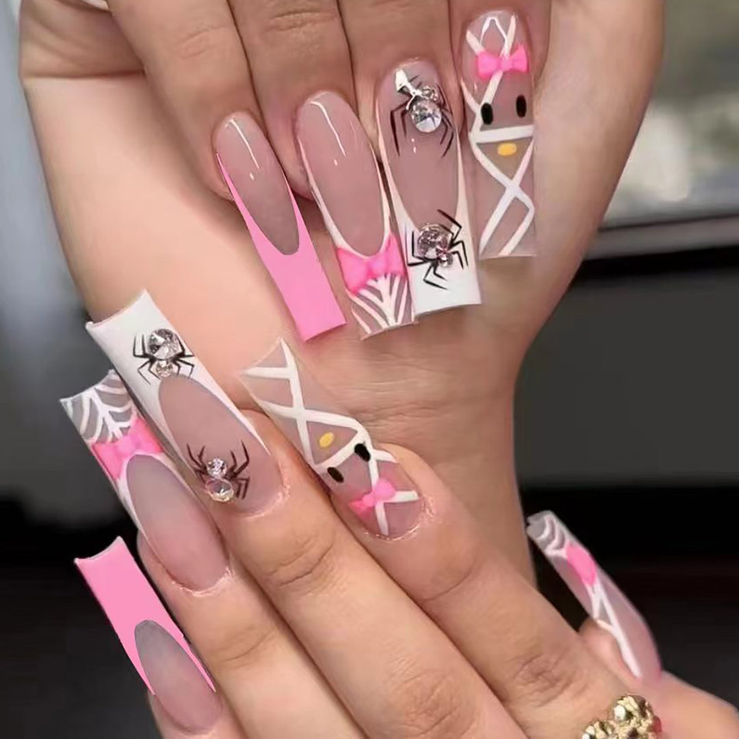 Künstlerische Press-On-Nagelerweiterungen mit Spinnen- und Schleifen-Design Karnz