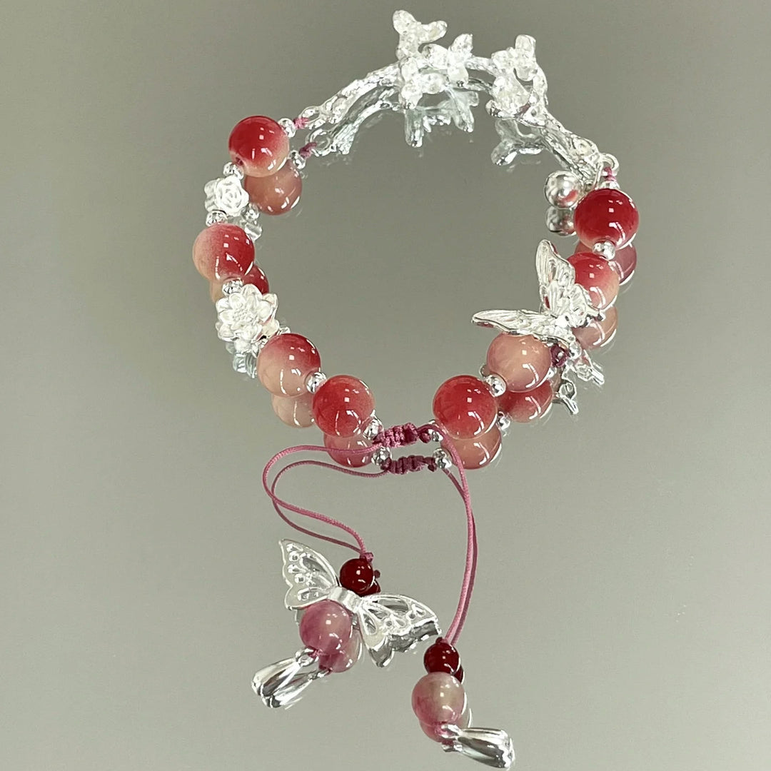 Handgefertigtes florales Schmetterlings-Charm-Armband Karnz