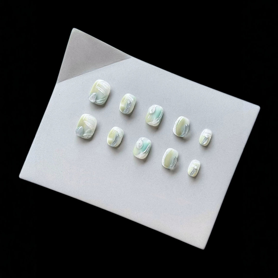 Künstlerisches Press-On-Nagelset mit glänzendem Marmor-Design