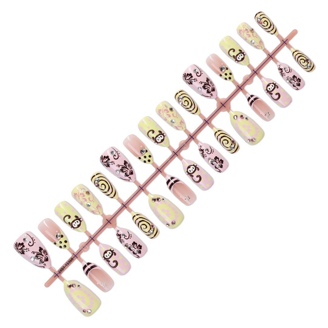 Kreatives Kunstnagelset mit verspielten Affenmotiven und Glitzerdetails Karnz