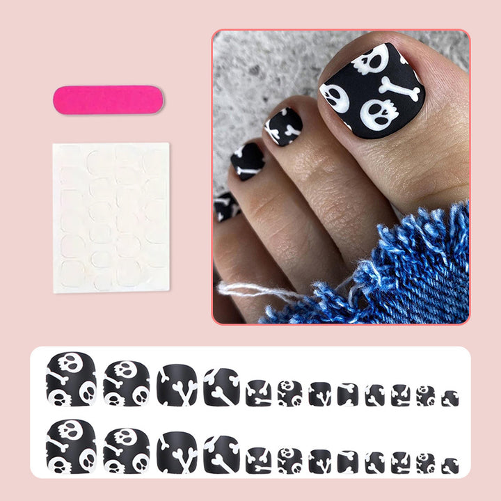 Fußnagel Kunstset mit kreativen Totenkopf- und Knochenmotiven Karnz