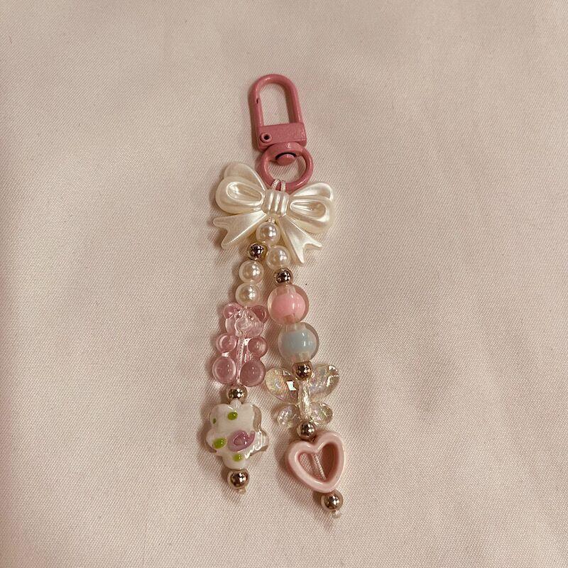 Dekorativer Charm-Handyband Karnz