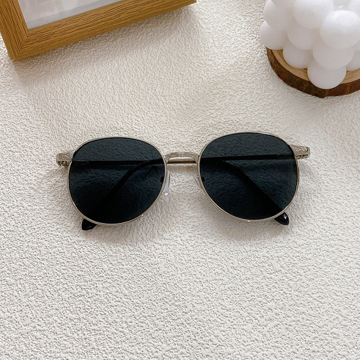 Modische Sonnenbrille mit Rundem Rahmen und Filigranem Design Karnz