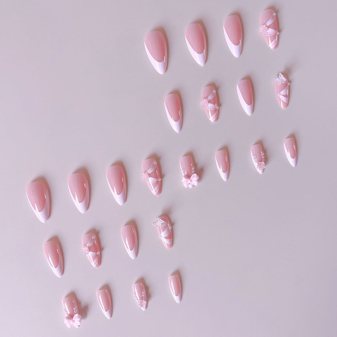 Kunstnagelset mit romantischen 3D-Blüten- und Schleifenverzierungen Karnz