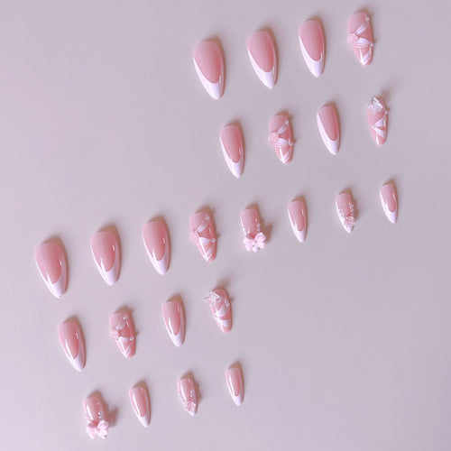 Kunstnagelset mit romantischen 3D-Blüten- und Schleifenverzierungen Karnz