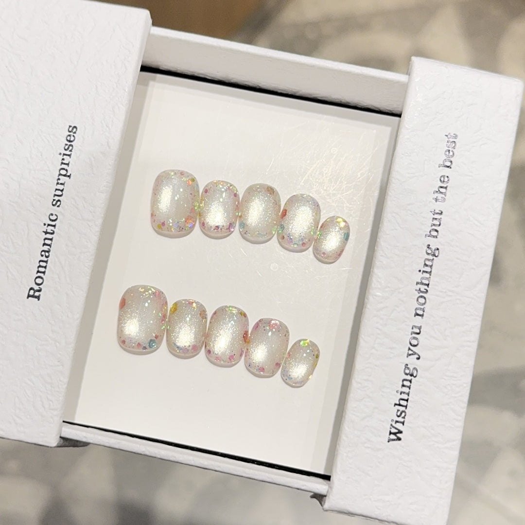 Kunstnagelset mit Romantischem Glitzereffekt Karnz