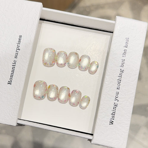 Kunstnagelset mit Romantischem Glitzereffekt Karnz