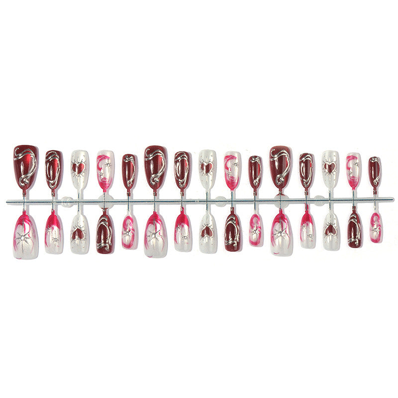 Künstlerisches Press-On Nagelkunstset mit eleganten Herzdesigns Karnz