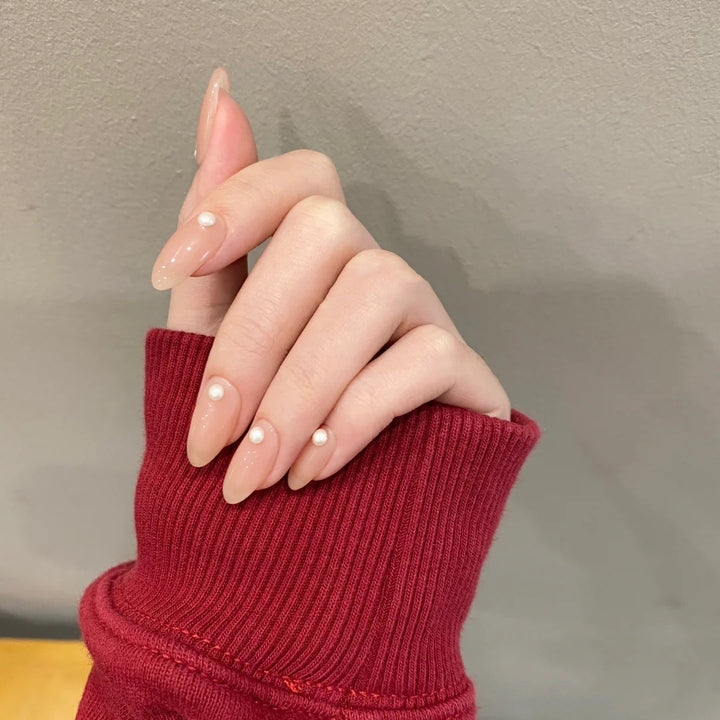 Kunstnägel mit eleganten Schleifenmotiven Karnz