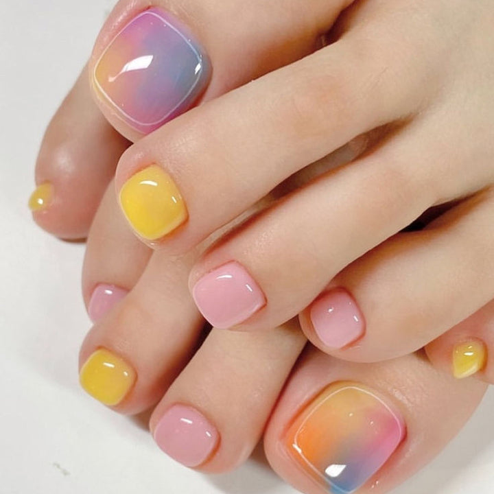Fußnagelkunstset mit buntem Farbverlauf und eleganten Designs Karnz