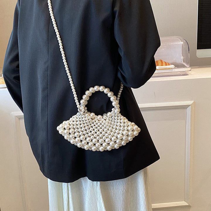 Elegante Handtasche mit Perlendetails