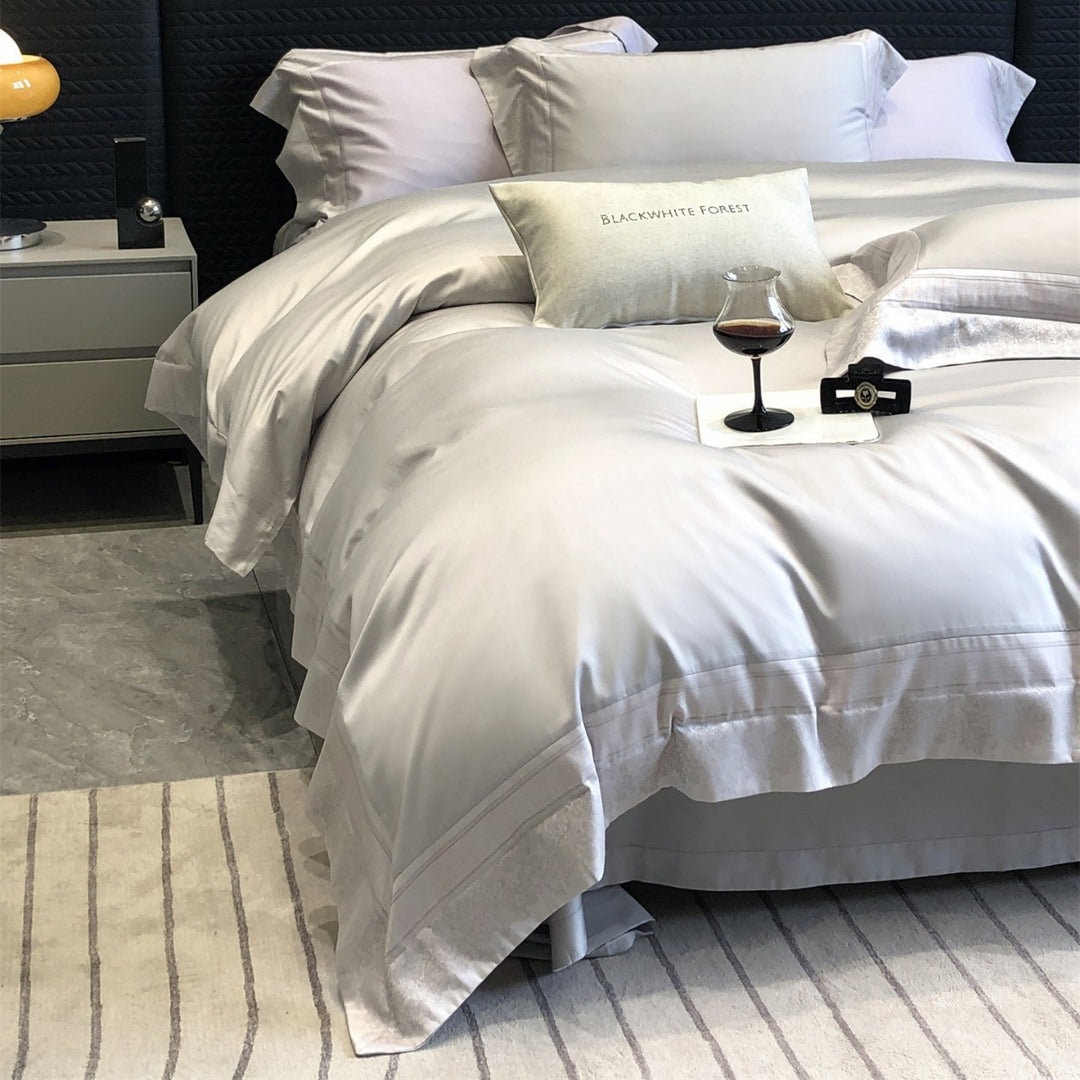 Luxuriöses Satin-Bettbezug-Set mit besticktem Rand