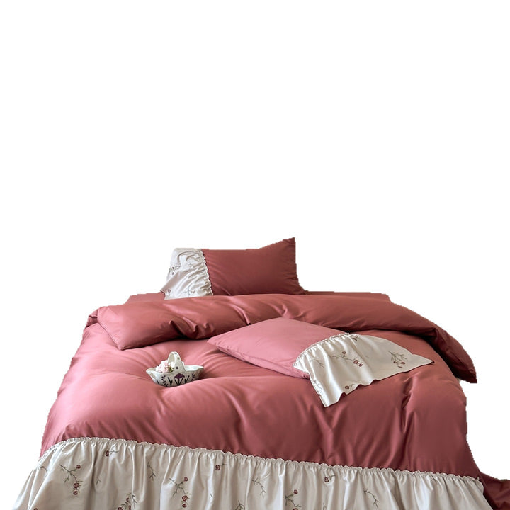 Elegantes Bettwäscheset aus Baumwollsatin mit besticktem Volant und Wendekissen