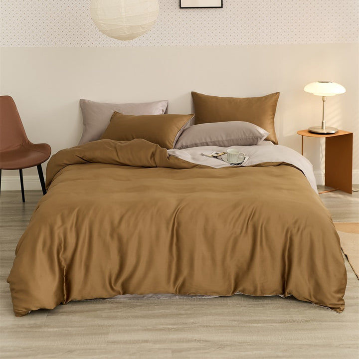 Wendbares Satin-Bettwäscheset mit seidig-glänzendem Griff und hautfreundlichem Baumwollmix