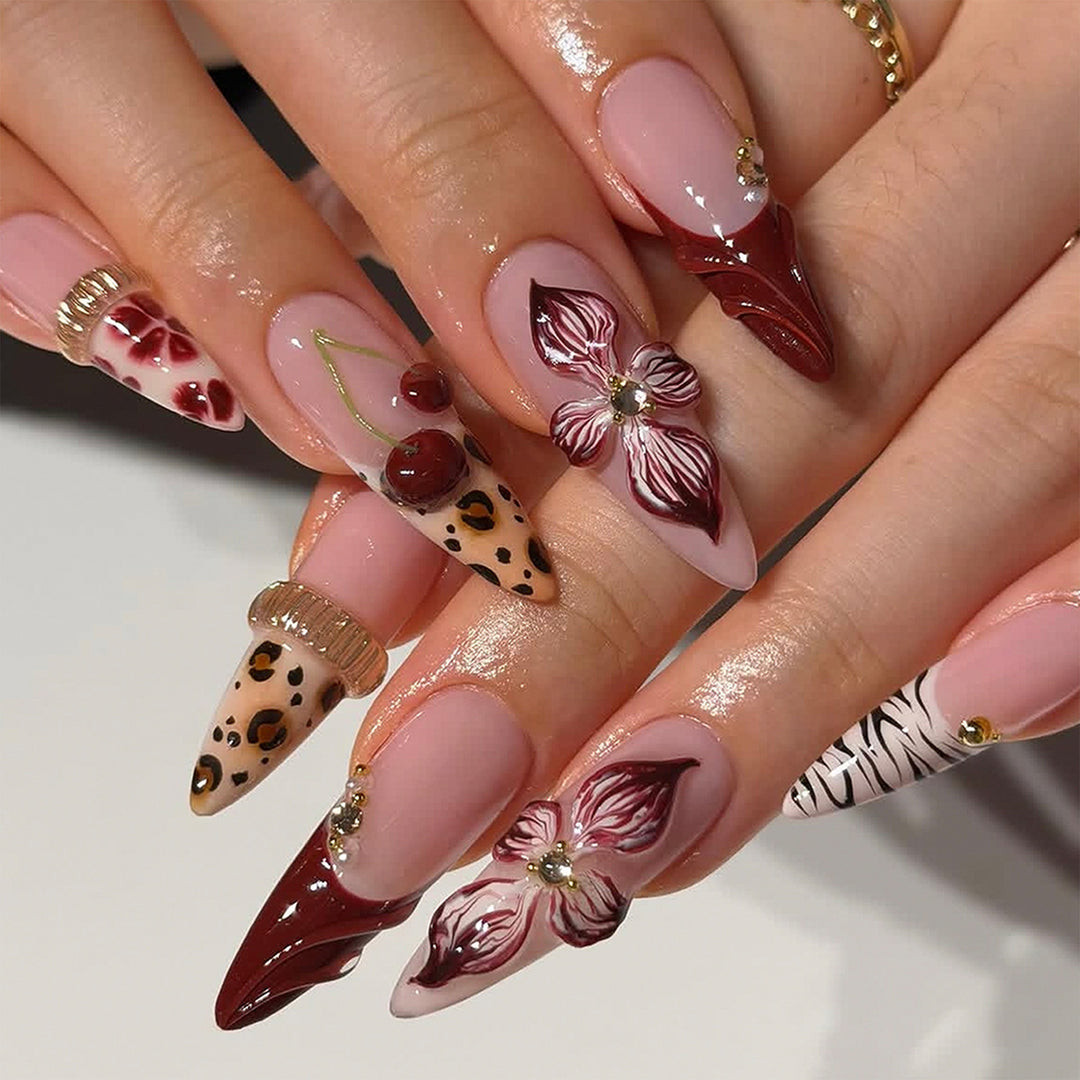 Künstliche Nagelkunst mit floralen und tierischen Motiven Karnz