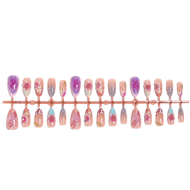 Kunstnagel-Set mit floralen und glitzernden Akzenten Karnz