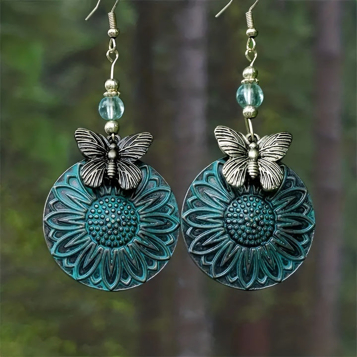 Elegante Ohrhänger mit Blumenmotiv und Schmetterlingen Karnz
