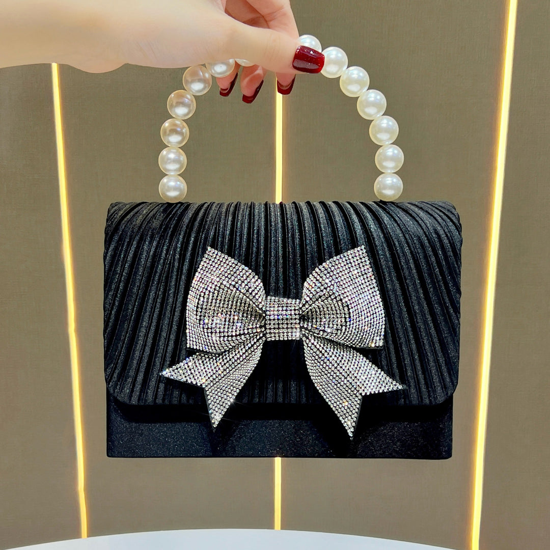 Elegante Abendtasche mit Schleifenverzierung