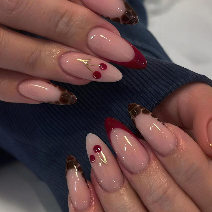 Kunstnagelset mit eleganten Ombré-Designs und glamourösen Akzenten Karnz