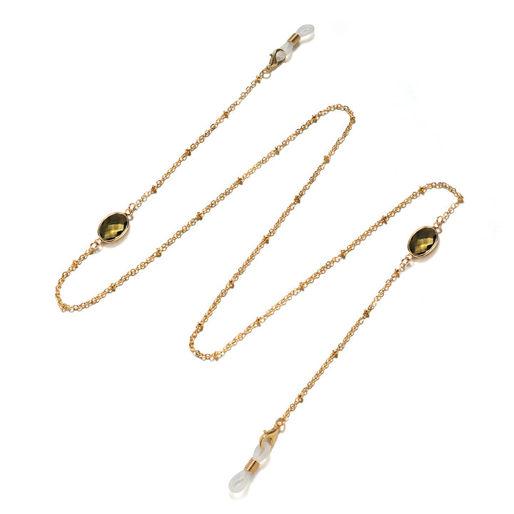 Eleganter mit Edelsteinen verzierter Brillenhalter Karnz