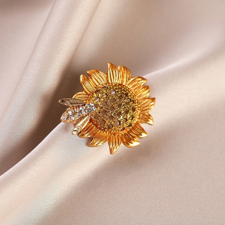 Elegante Sonnenblumenbrosche mit Kristallen Karnz