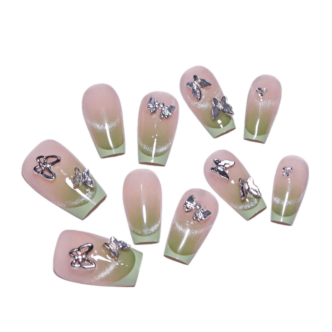 Elegante Kunstnägel mit Schmetterlingsdesign Karnz