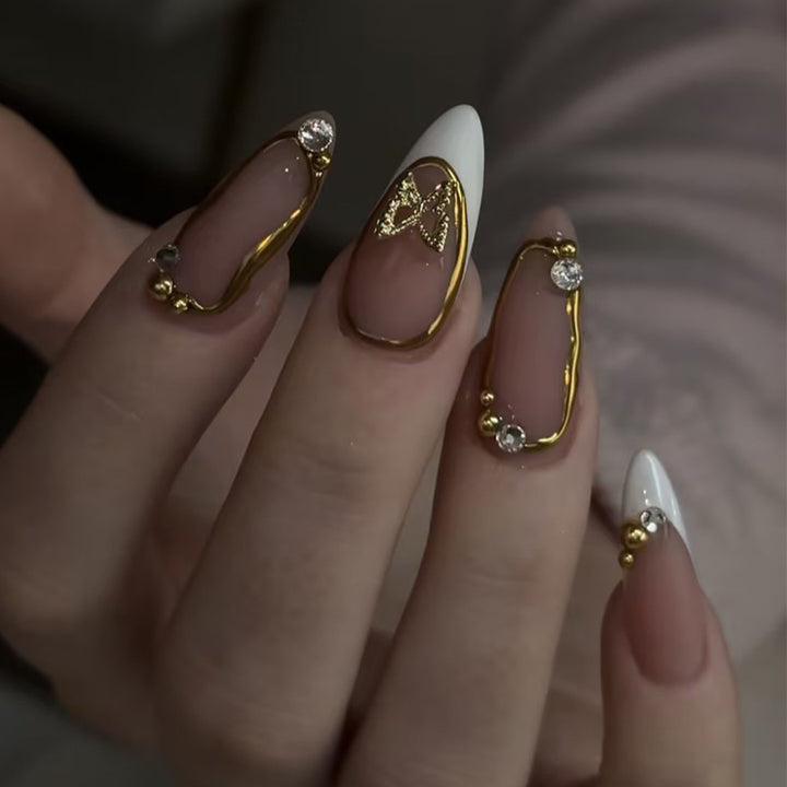 Kunstnagel Set mit eleganten Schleifen und Glamourösem Akzent Karnz