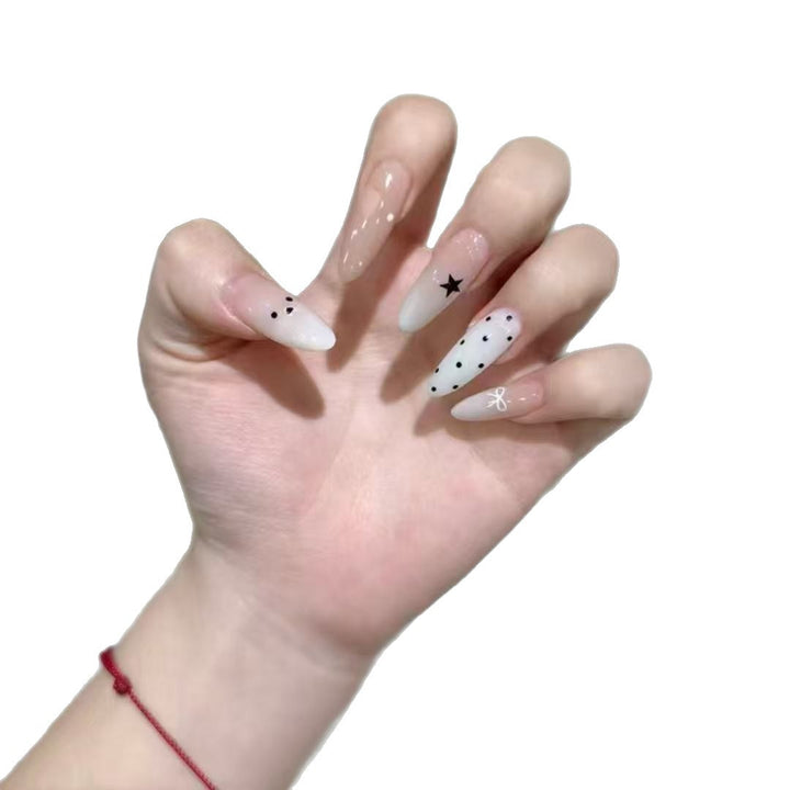 Künstlerisches Press-On-Nagelset mit Stern- und Punktemustern Karnz