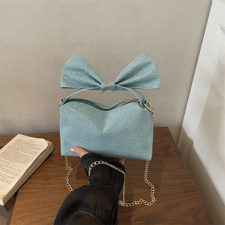 Bogen-accentuierte funkelnde Handtasche