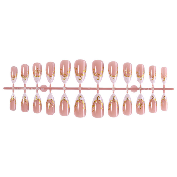 Dekoratives Premium Press-On Nagelset mit goldenen Akzenten Karnz
