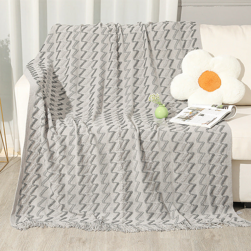 Gemütliche Strickwurfdecke