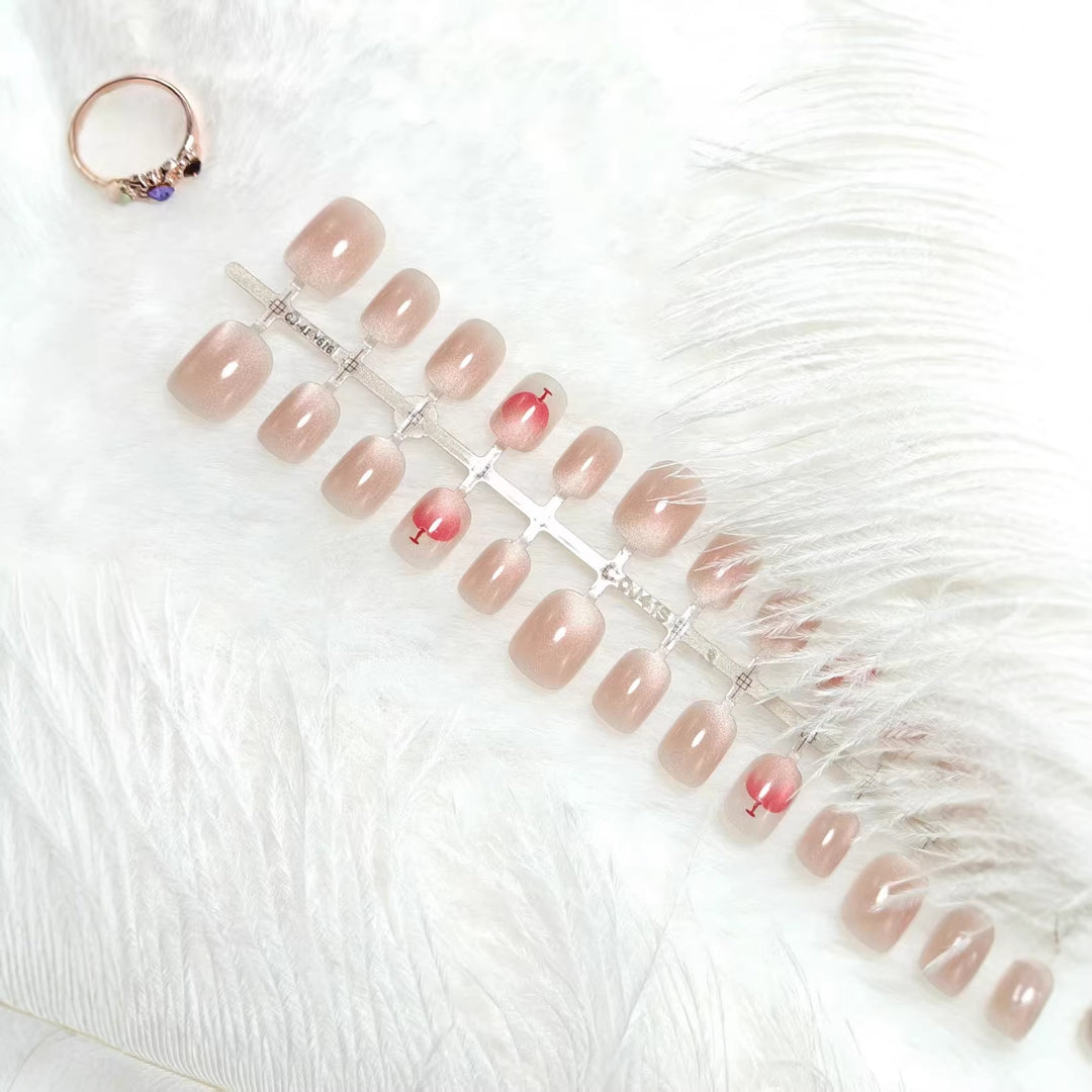 Elegante Kunstnägel mit Glitzer- und Cocktail-Design Karnz